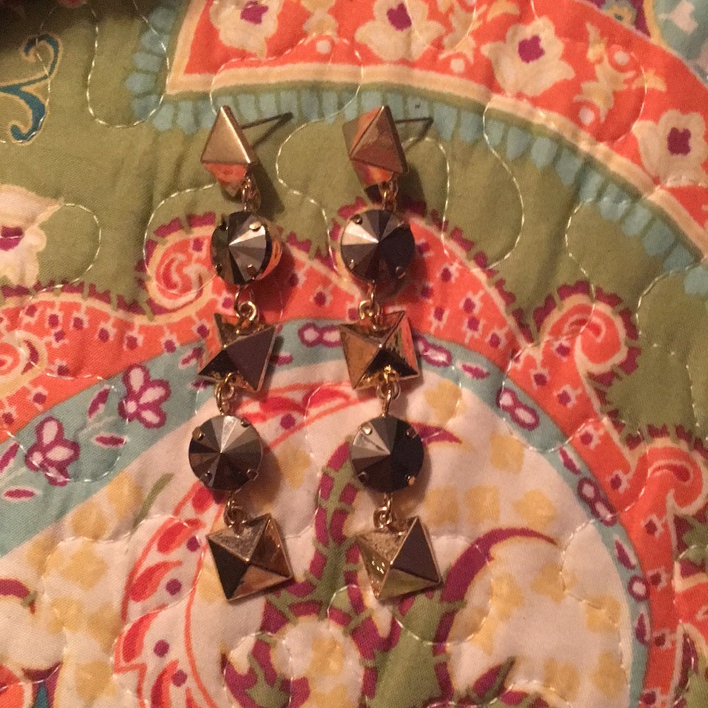 Gold and black dangling earrings